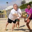 Sir Ed Davey played veach volleyball with young carers and staff on Brighton Beach. Pic: PA