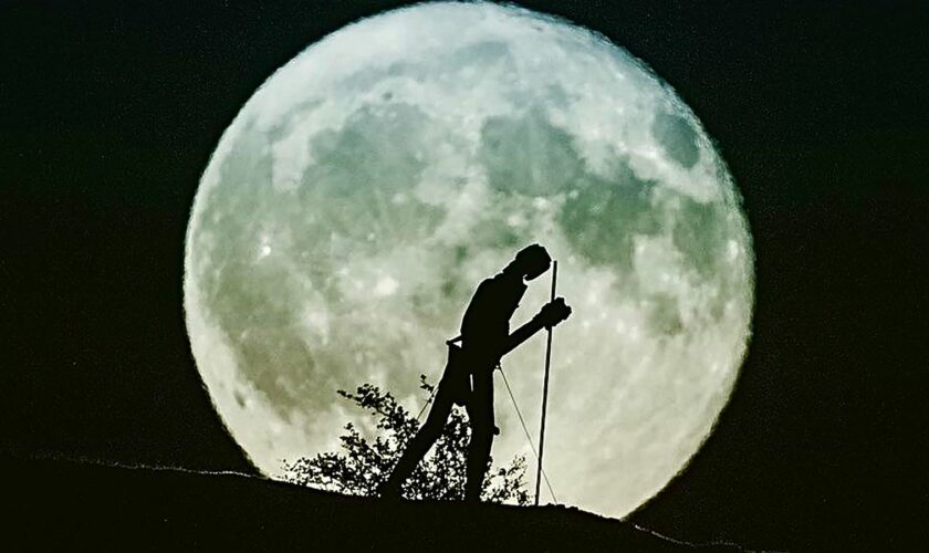 Moon behind the Pilgrim statue near Pontrhydfendigaid in Wales. Pic: Dafydd Wyn Morgan/Cambrian Mountains Initiative