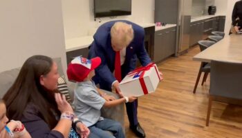 ‘Trump 2024!': Young supporter with rare brain disorder beams after surprise meeting with former president