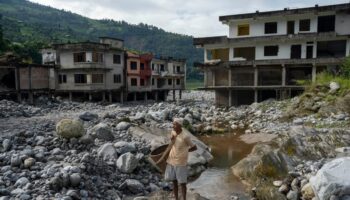 AP PHOTOS: Cascading disasters push residents of a Nepalese valley to the brink