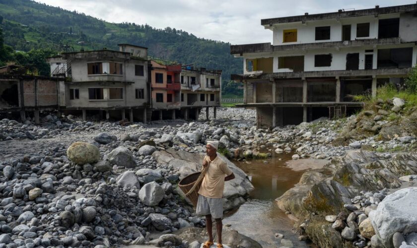 AP PHOTOS: Cascading disasters push residents of a Nepalese valley to the brink