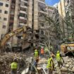 Anxious families line the pavement as dozens remain missing in the rubble after Beirut strike