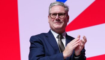 Prime Minister Sir Keir Starmer and Chancellor of the Exchequer Rachel Reeves clap their hands during the Labour Party Conference in Liverpool. Picture date: Sunday September 22, 2024.