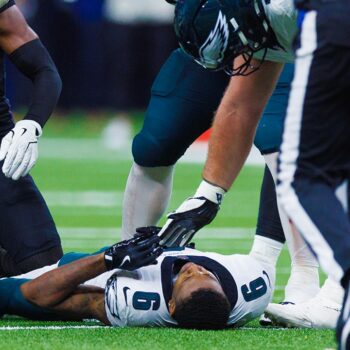 Eagles' DeVonta Smith's helmet flies off after 'dirty' hit in scary scene vs Saints