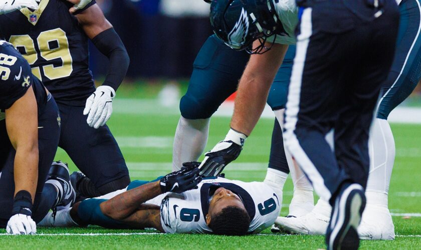 Eagles' DeVonta Smith's helmet flies off after 'dirty' hit in scary scene vs Saints