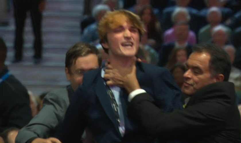 Protestor during Rachel Reeves speech