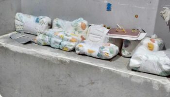 Huge amounts of cash was found stashed in nappies. Pic: PA