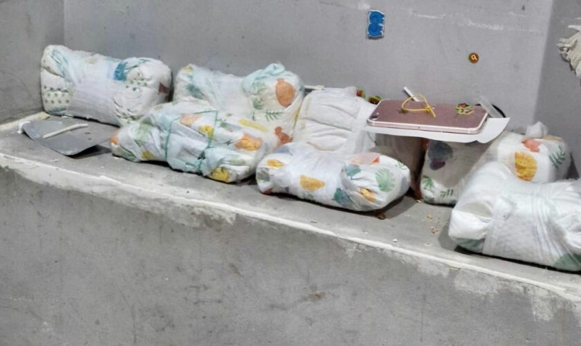 Huge amounts of cash was found stashed in nappies. Pic: PA