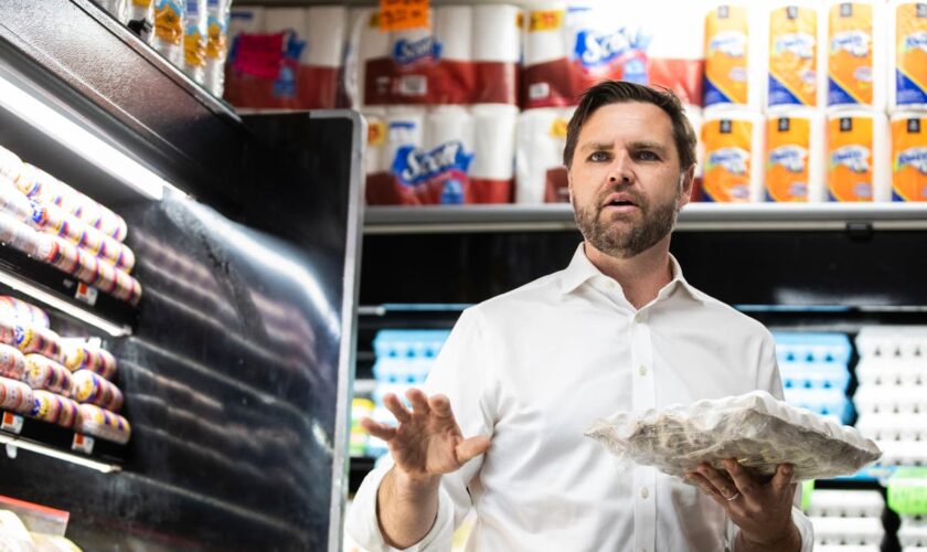 JD Vance claims eggs cost $4 because of Harris — while standing directly in front of a dozen for $2.99