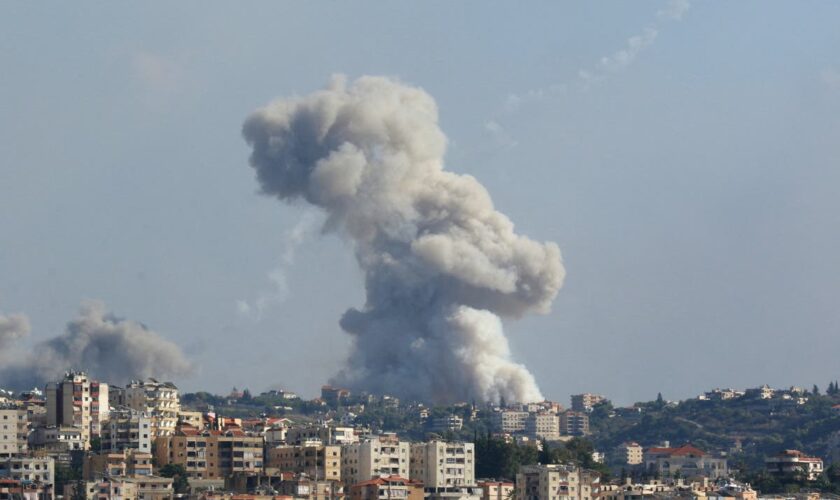 Israel-Lebanon latest: Israeli military fires dozens more missiles as thousands forced to flee homes