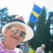 03 September 2019, Baden-Wuerttemberg, Konstanz: Wilfriede wears a Swedish flag on her hat during a visit of the Swedish queen to the flower island Mainau. The occasion for the visit is the 25th anniversary of the Mentor Foundation for Young People, which Silvia co-founded in Geneva in 1994. Photo: Sebastian Gollnow/dpa (Photo by Sebastian Gollnow / DPA / dpa Picture-Alliance via AFP)