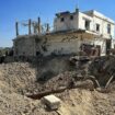 A crater on the side of a road after an Israeli airstrike on the side of the main coastal highway linking Aalma El Chaeb to Beirut