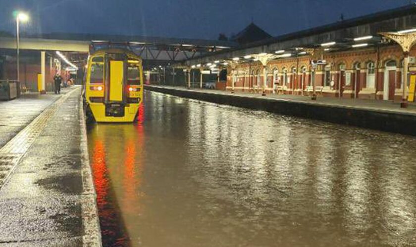 Motorway closed as drivers abandon cars amid 185 flood warnings and torrential rain