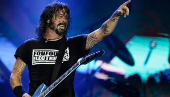 FILE - In this Sept. 29, 2019, file photo, Dave Grohl of the band Foo Fighters performs at the Rock in Rio music festival in Rio de Janeiro, Brazil. Foo Fighters will perform at the iHeartRadio Music Festival in Las Vegas. (AP Photo/Leo Correa, File)