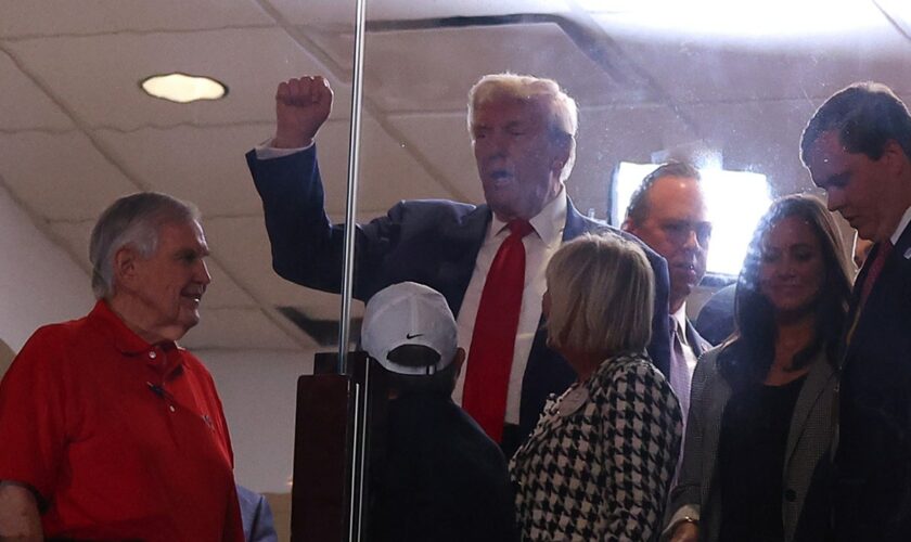 Trump arrives at Alabama-Georgia game to chants of 'USA,' 'Four more years'