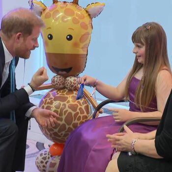 Duke of Sussex with Scarlett Cripps at the WellChild Awards, grab from pool footage in system