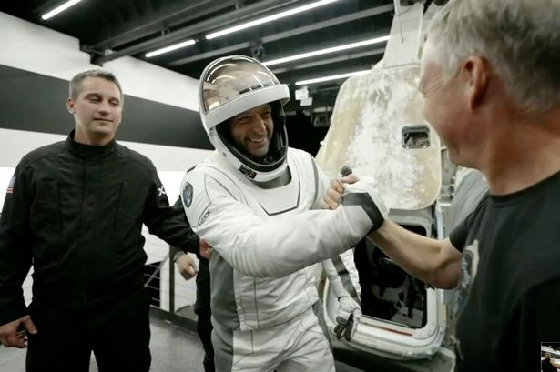 Billionaire first tourist spacewalker in dramatic return to Earth after breaking record