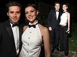 Brooklyn Beckham twins with wife Nicola Peltz in matching tux ensembles as they support mum Victoria at her PFW show