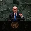 Diplomats walk out as Benjamin Netanyahu calls the UN an 'anti-Semitic swamp' in fiery speech