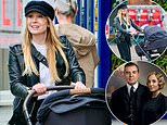 Downton Abbey star Joanne Froggatt shows she is not too posh to push as she takes her newborn baby for a stroll after giving birth earlier this month