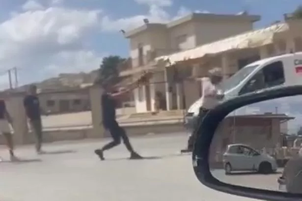 Drivers filmed 'using chainsaws like swords' in wild road rage duel in street