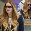 Elle Macpherson keeps her head down at Sydney Airport as she's seen for the first time since revealing she used unconventional treatment for breast cancer diagnosis