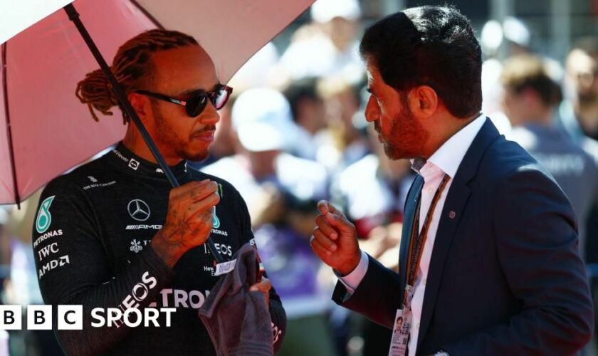 Lewis Hamilton speaks to FIA president Mohammed ben Sulayem on the grid in Baku in 2022