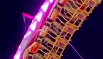 Fairground terror moment as five people rescued from rollercoaster stuck upside-down