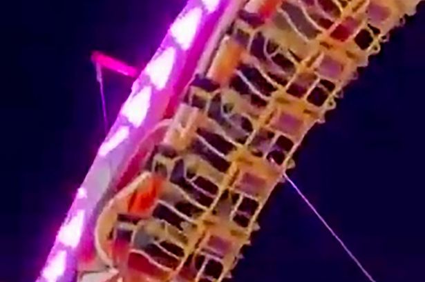 Fairground terror moment as five people rescued from rollercoaster stuck upside-down