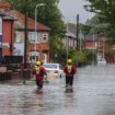 Flood warnings across UK as roads swamped by water and travel delays hit Britain