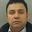 Head of smuggling gang who brought hundreds of people into the UK jailed - but remains at large