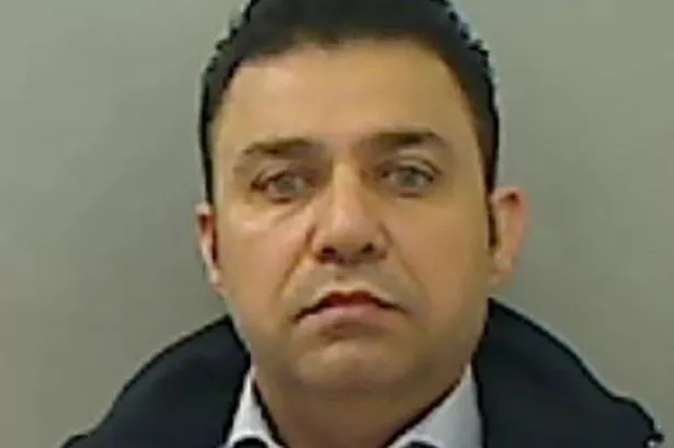 Head of smuggling gang who brought hundreds of people into the UK jailed - but remains at large