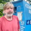 Homeless man living inside city clothes bin says 'it's the comfiest bed I've had'