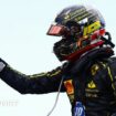 An emotional Charles Leclerc celebrates on the podium