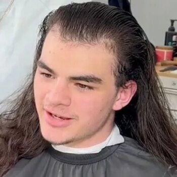 Man with long hair travels an hour for trim – and is mind-blown by transformation