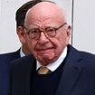 Media mogul Rupert Murdoch is all smiles as he enters court with his heir apparent Lachlan on second day of battle over News Corp empire