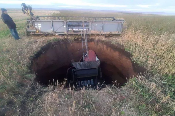 Moment 'Gates of Hell' twin sinkholes open up 400 miles apart in Siberia causing chaos