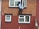 Moment blundering drug dealer, 27, leaps from upstairs window and jumps over fence to escape police without realising he is being followed by a drone