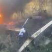 Moment man survives crash with '90% burns' after jumping from flaming helicopter