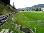 Pictured: Five of the most bizarre soccer stadiums in the world, from one in the UK with entrances inside a row of houses to one with a RAILWAY running through it