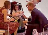 Prince Harry meets with ill children at WellChild awards: Duke is pictured chatting with youngsters as he makes rare visit to the UK without Meghan while King is in Scotland