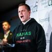 Robert Jenrick vows to emulate Donald Trump by moving the British embassy in Israel to its 'legitimate capital' Jerusalem as he gives conference speech in 'Hamas are terrorists' hoodie