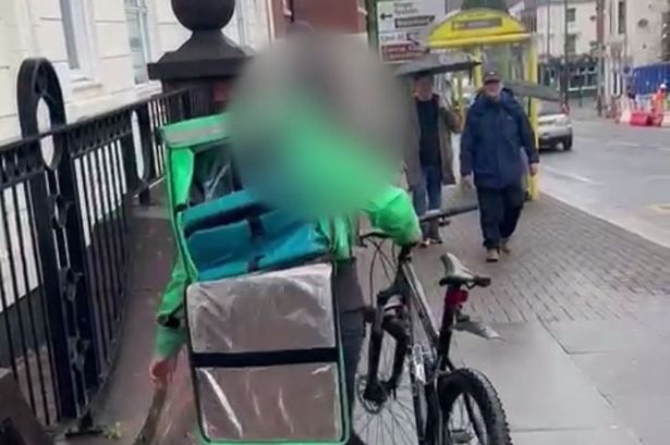 Shocking moment Uber Eats rider filmed stamping on customer's Chinese food order