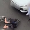 Shocking road rage moment cyclist is hurled to ground by driver in busy city centre