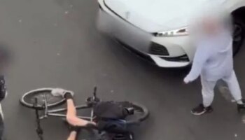 Shocking road rage moment cyclist is hurled to ground by driver in busy city centre