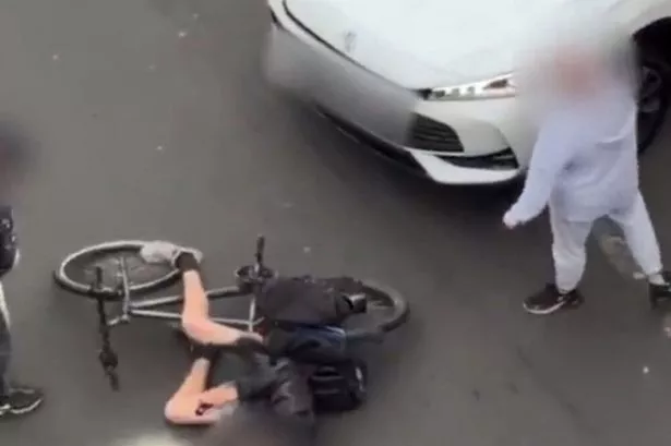 Shocking road rage moment cyclist is hurled to ground by driver in busy city centre