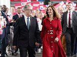 The Red Queen! Vic Starmer joins Sir Keir at Labour conference in 'loaned' £1,100 designer dress as PM makes leader's speech to party faithful amid clothing and football freebies row