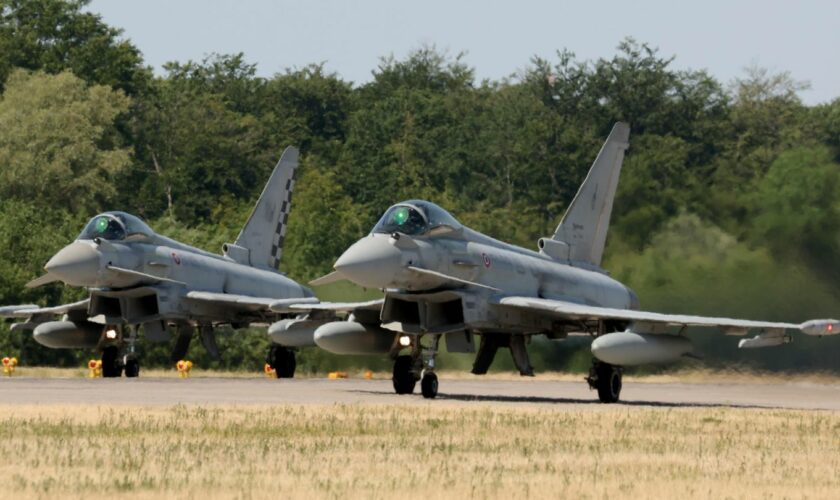 Eurofighter der Bundeswehr stehen auf der Startbahn in Laage (Mecklenburg-Vorpommern) an der Ostsee