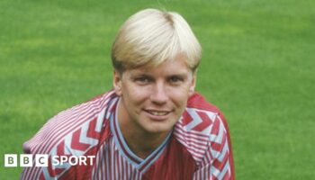 Gary Shaw posing in an Aston Villa kit