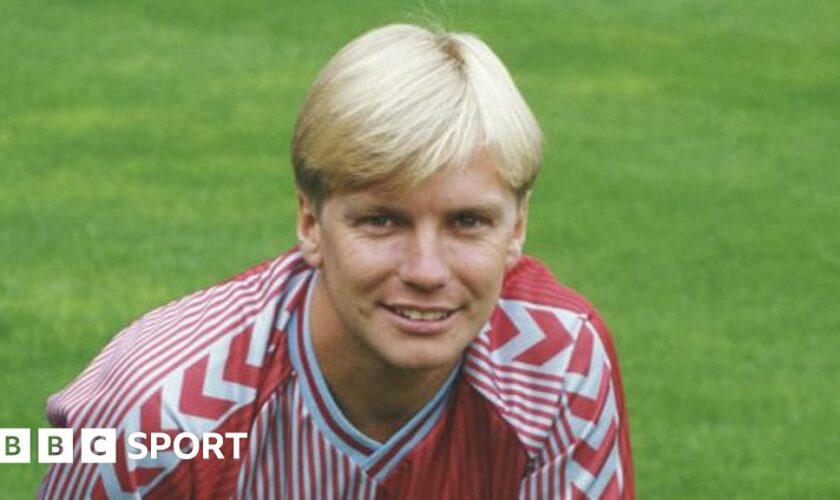 Gary Shaw posing in an Aston Villa kit